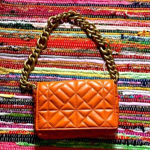Orange faux leather quilted Zara bag with cold shoulder hardware strap